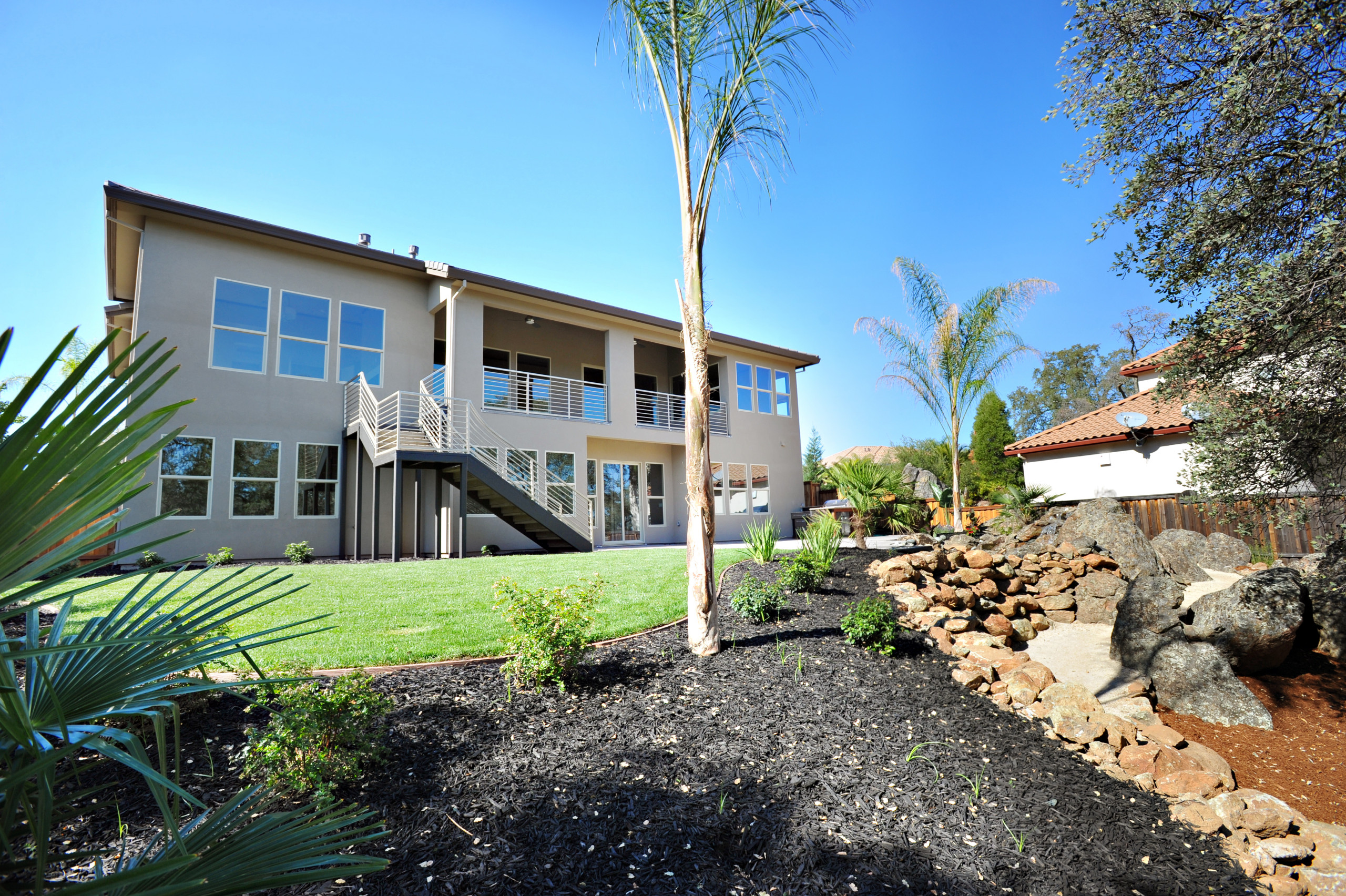 Rear elevation overlooking the lawn and landscaped garden