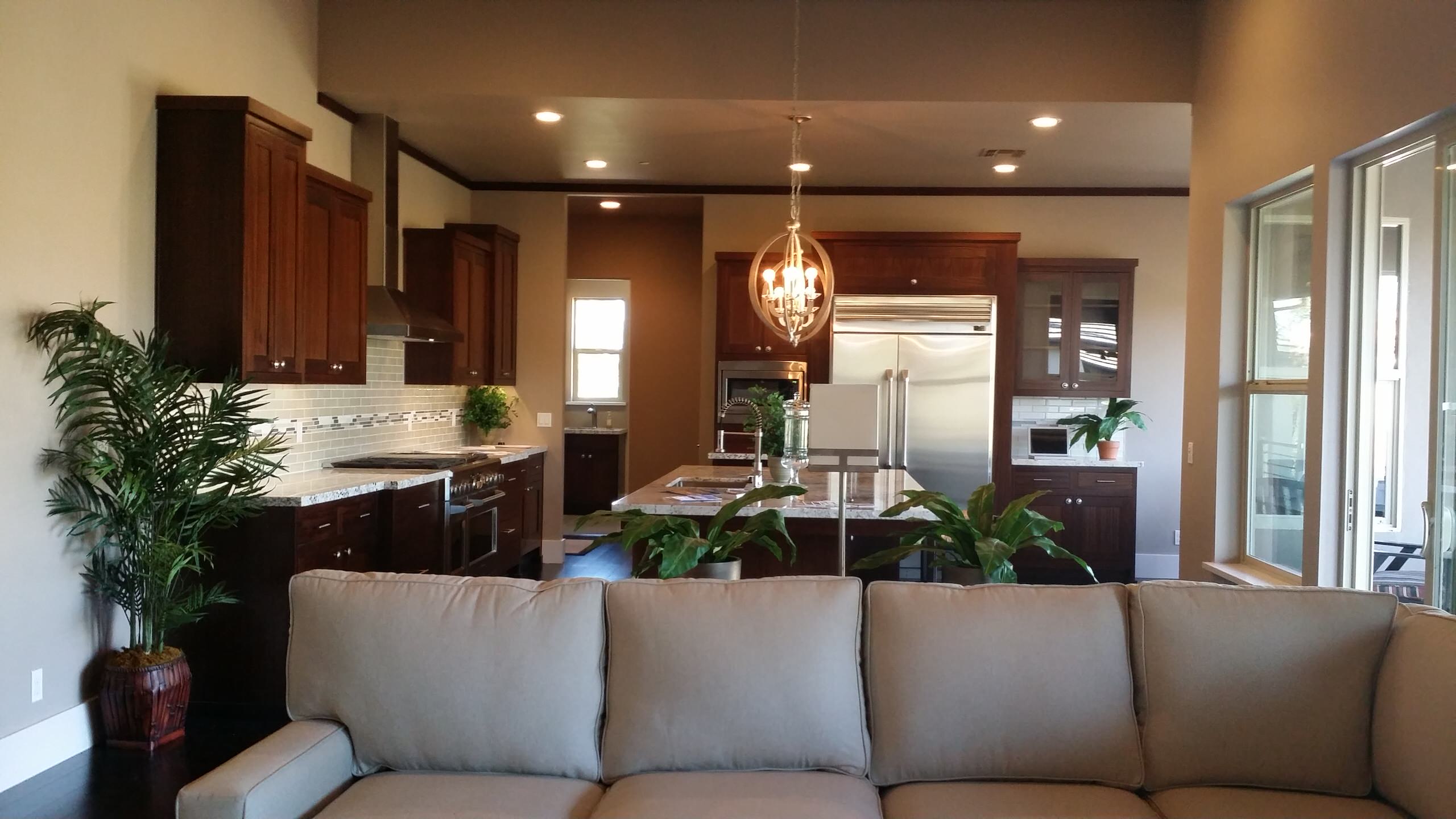 Open living area connecting the kitchen and dining spaces