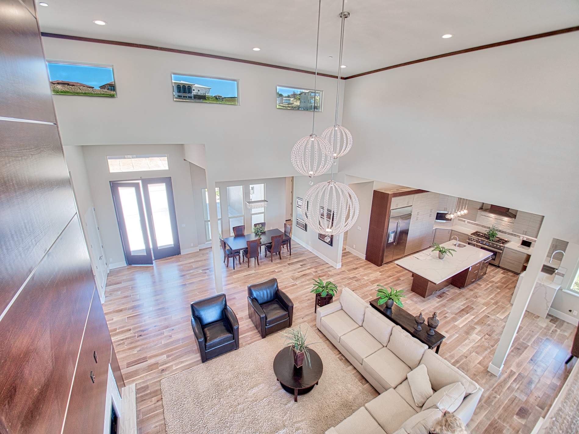 Elevated view across the two-story great room and kitchen